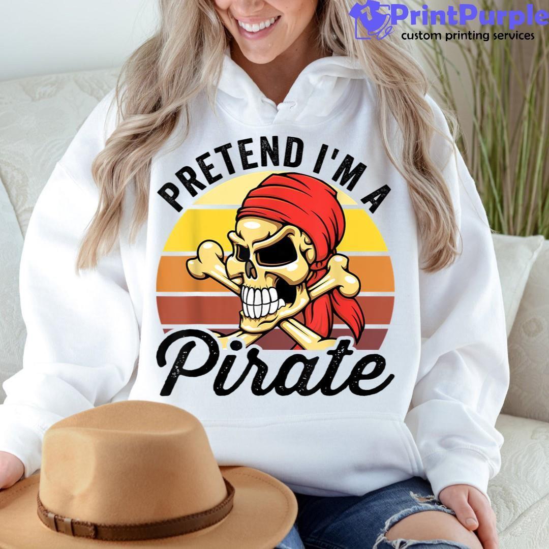 Pretend I'm A Pirate T shirt Design Vector. Skull in pirate bandana with  knife in mouth. Print for T-shirt, typography, vintage graphic print for t  shirt , fashion, sticker, posters and others.